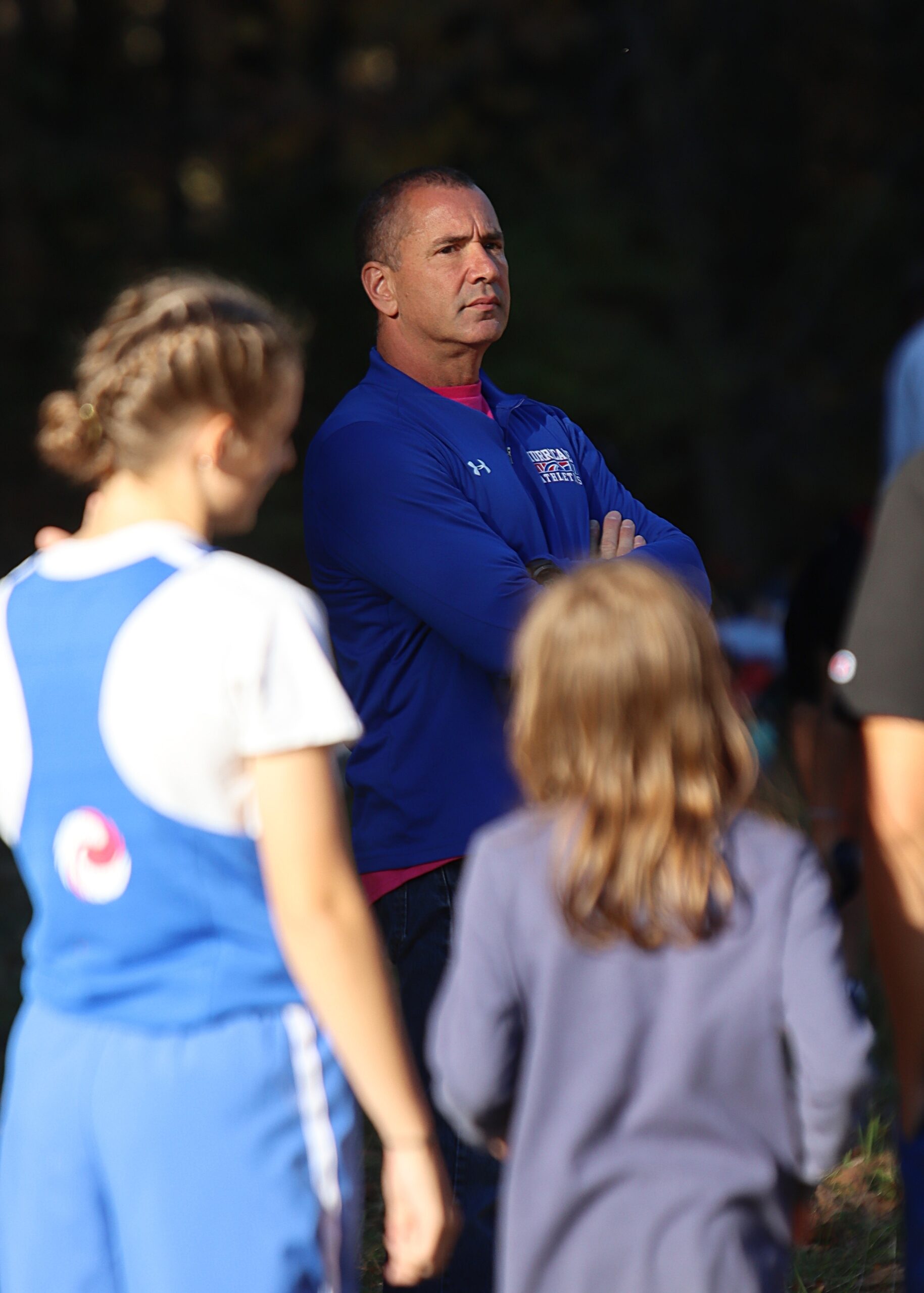 Coach Joe watching a game