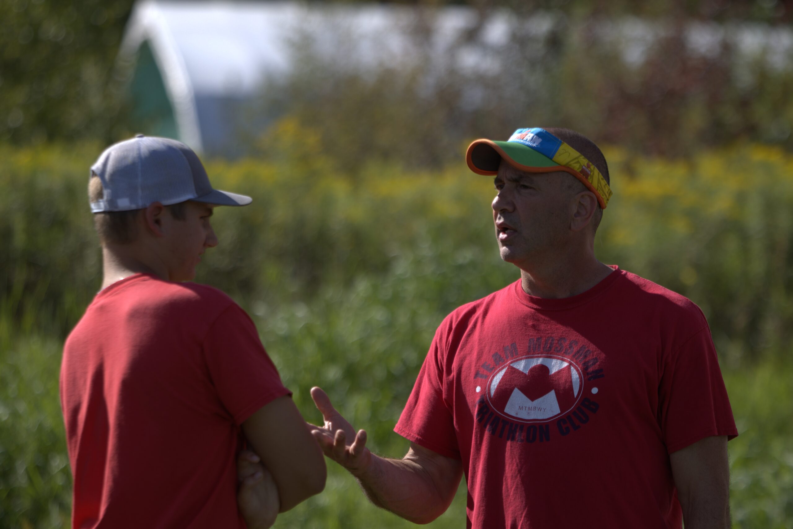 Coach Joe talking to a player