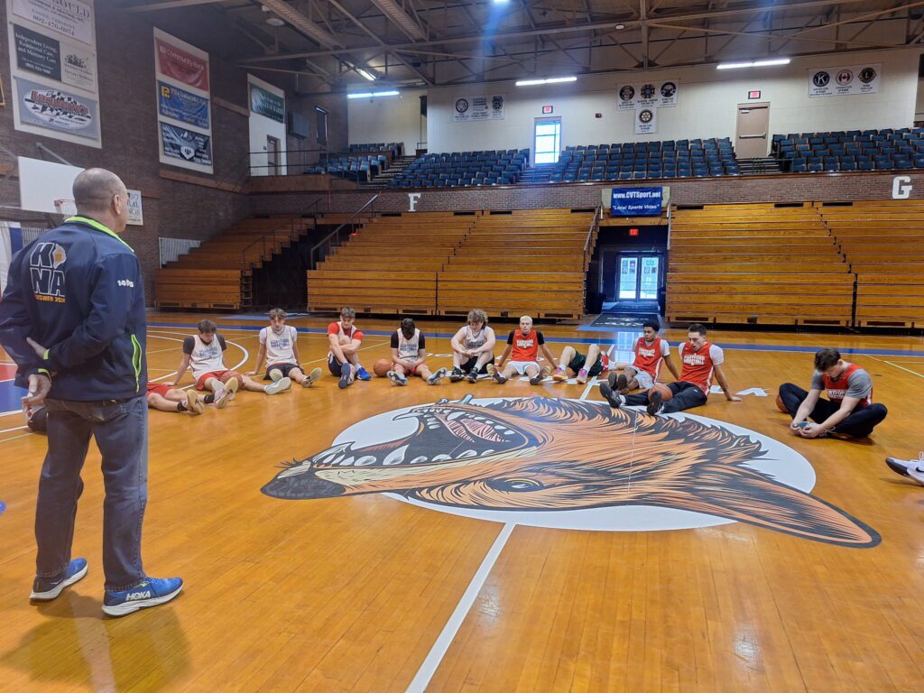 Basketball players prepping for a game