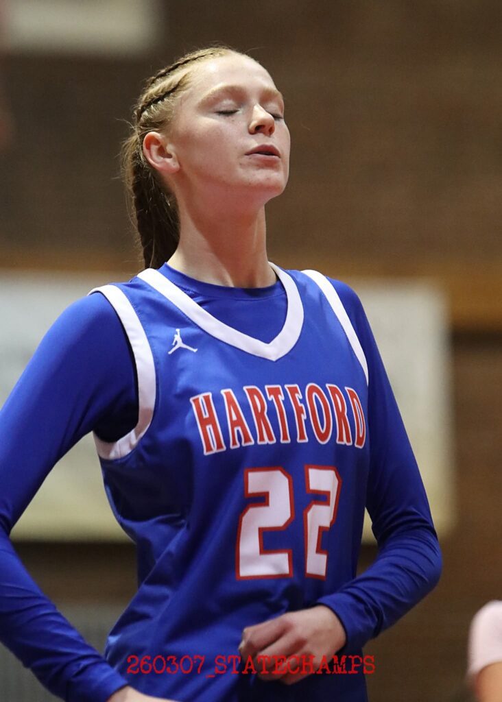 Student athlete practicing breathing technique
